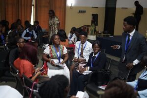 Delegates participate in an informal hot-takes session during the UNHRC committee at LTMUN 2026.